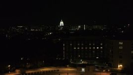 5.7K aerial stock footage of the state capitol dome at night, seen from hospital, Madison, Wisconsin Aerial Stock Footage | DX0002_163_014