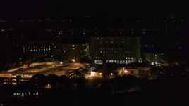 5.7K aerial stock footage of an orbit of a hospital at night, Madison, Wisconsin Aerial Stock Footage | DX0002_163_017