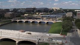 5.7K aerial stock footage of three bridges spanning the river in Des Moines, Iowa Aerial Stock Footage | DX0002_165_009