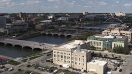 5.7K aerial stock footage approach bridges spanning the river in Des Moines, Iowa Aerial Stock Footage | DX0002_165_012