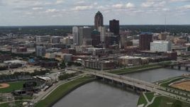 5.7K aerial stock footage a reverse view of skyline across the river, Downtown Des Moines, Iowa Aerial Stock Footage | DX0002_165_019