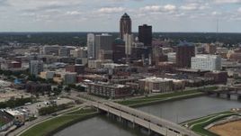 5.7K aerial stock footage of the city's skyline seen from a bridge over the river, Downtown Des Moines, Iowa Aerial Stock Footage | DX0002_165_021