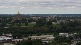 5.7K aerial stock footage of descending past the Iowa State Capitol and grounds in Des Moines, Iowa Aerial Stock Footage | DX0002_165_038
