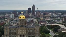 5.7K aerial stock footage of a view of the Downtown Des Moines, Iowa skyline seen while passing the capitol Aerial Stock Footage | DX0002_166_007