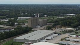 5.7K aerial stock footage orbit a grain elevator in Des Moines, Iowa Aerial Stock Footage | DX0002_166_023