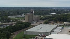 5.7K aerial stock footage of a grain elevator and warehouse building in Des Moines, Iowa Aerial Stock Footage | DX0002_166_024