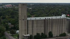 5.7K aerial stock footage a reverse view of a grain elevator in Des Moines, Iowa Aerial Stock Footage | DX0002_166_025