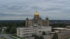 5.7K aerial stock footage stationary view of the Iowa State Capitol behind government building, Des Moines, Iowa Aerial Stock Footage | DX0002_166_027