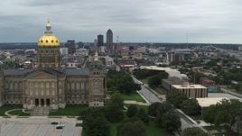 5.7K aerial stock footage of flying away from the distant skyline and reveal the capitol building, Des Moines, Iowa Aerial Stock Footage | DX0002_166_038