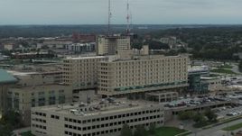 5.7K aerial stock footage approach and orbit side of a hospital in Des Moines, Iowa Aerial Stock Footage | DX0002_167_009