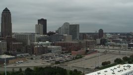 5.7K aerial stock footage reverse view of office buildings near the skyscraper in Downtown Des Moines, Iowa Aerial Stock Footage | DX0002_167_028