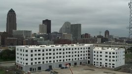 5.7K aerial stock footage office buildings near the skyscraper in Downtown Des Moines, Iowa, seen from construction Aerial Stock Footage | DX0002_167_030
