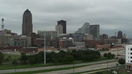 5.7K aerial stock footage ascend and approach office buildings and skyscraper in Downtown Des Moines, Iowa Aerial Stock Footage | DX0002_167_031