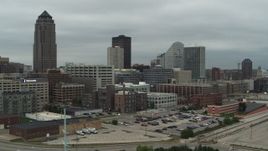 5.7K aerial stock footage fly away from office buildings and a skyscraper in Downtown Des Moines, Iowa Aerial Stock Footage | DX0002_167_032