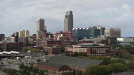 5.7K aerial stock footage ascend and flyby the downtown skyline in Downtown Omaha, Nebraska Aerial Stock Footage | DX0002_168_008