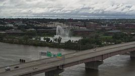 5.7K aerial stock footage of a fountain in a riverfront park on the other side of the river, Omaha, Nebraska Aerial Stock Footage | DX0002_168_024