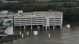 5.7K aerial stock footage orbit around a flooded parking garage in Council Bluffs, Iowa Aerial Stock Footage | DX0002_169_016
