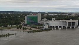 5.7K aerial stock footage of the hotel and casino in Council Bluffs, Iowa, seen from the river Aerial Stock Footage | DX0002_169_038