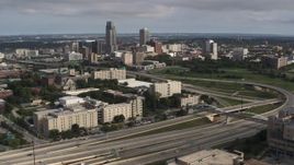 5.7K aerial stock footage view of the city's skyline seen from university and North Freeway, Downtown Omaha, Nebraska Aerial Stock Footage | DX0002_170_015