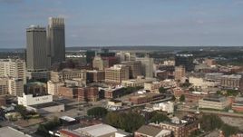 5.7K aerial stock footage of circling office buildings near skyscrapers in Downtown Omaha, Nebraska Aerial Stock Footage | DX0002_170_029
