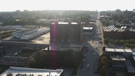 5.7K aerial stock footage a brick office building at sunset, Downtown Omaha, Nebraska Aerial Stock Footage | DX0002_170_049