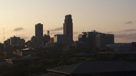 5.7K aerial stock footage approach and flyby skyscraper and skyline at sunset, Downtown Omaha, Nebraska Aerial Stock Footage | DX0002_172_012