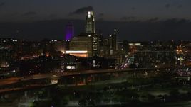 5.7K aerial stock footage approach the city's skyline at twilight, Downtown Omaha, Nebraska Aerial Stock Footage | DX0002_173_018
