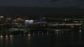 5.7K aerial stock footage focus on arena and convention center complex at night during descent, Downtown Omaha, Nebraska Aerial Stock Footage | DX0002_173_027