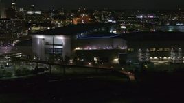 5.7K aerial stock footage ascend and orbit arena and convention center complex at night, Downtown Omaha, Nebraska Aerial Stock Footage | DX0002_173_030