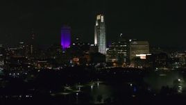 5.7K aerial stock footage ascend and flyby towering skyscrapers and high-rises at night, Downtown Omaha, Nebraska Aerial Stock Footage | DX0002_173_058