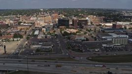 5.7K aerial stock footage a view of office buildings while passing by I-29, Downtown Sioux City, Iowa Aerial Stock Footage | DX0002_174_018