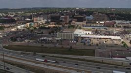 5.7K aerial stock footage fly over I-29 toward hotel and office buildings in Downtown Sioux City, Iowa Aerial Stock Footage | DX0002_174_022