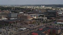 5.7K aerial stock footage of flying past office buildings, Downtown Sioux City, Iowa Aerial Stock Footage | DX0002_175_001