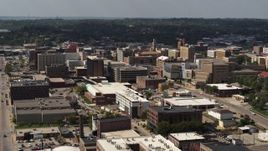 5.7K aerial stock footage flying by the convention center and office buildings, Downtown Sioux City, Iowa Aerial Stock Footage | DX0002_175_025