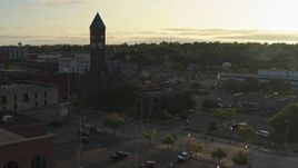 5.7K aerial stock footage of flying toward the Old Courthouse Museum at sunset in Downtown Sioux Falls, South Dakota Aerial Stock Footage | DX0002_176_025