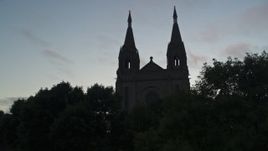 5.7K aerial stock footage ascend and reveal the Cathedral of Saint Joseph at twilight in Sioux Falls, South Dakota Aerial Stock Footage | DX0002_176_032