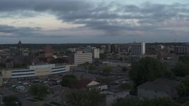 5.7K aerial stock footage the city's downtown area at twilight, Downtown Sioux Falls, South Dakota Aerial Stock Footage | DX0002_176_033