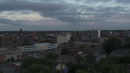 5.7K aerial stock footage ofpassing by the city's downtown area at twilight, Downtown Sioux Falls, South Dakota Aerial Stock Footage | DX0002_176_035