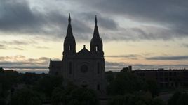 5.7K aerial stock footage close orbit of the Cathedral of Saint Joseph at twilight in Sioux Falls, South Dakota Aerial Stock Footage | DX0002_176_038