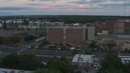 5.7K aerial stock footage of orbiting a county government building at twilight, Downtown Sioux Falls, South Dakota Aerial Stock Footage | DX0002_176_040
