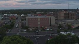 5.7K aerial stock footage of an orbit of a county government building at twilight, Downtown Sioux Falls, South Dakota Aerial Stock Footage | DX0002_176_042