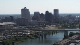 5.7K aerial stock footage stationary view of the city's skyline and bridge before descent in Downtown Memphis, Tennessee Aerial Stock Footage | DX0002_177_004