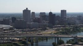 5.7K aerial stock footage flyby and away from the city's skyline and bridge spanning the river in Downtown Memphis, Tennessee Aerial Stock Footage | DX0002_177_009