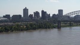 5.7K aerial stock footage of the skyline and bridge seen from the river in Downtown Memphis, Tennessee Aerial Stock Footage | DX0002_177_013