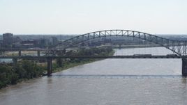 5.7K aerial stock footage of a bridge spanning the Mississippi River, Memphis, Tennessee Aerial Stock Footage | DX0002_177_015