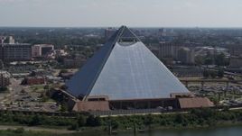 5.7K aerial stock footage of orbiting the waterfront Memphis Pyramid in Downtown Memphis, Tennessee Aerial Stock Footage | DX0002_177_021
