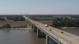 5.7K aerial stock footage ascending from the bridge to Arkansas spanning the Mississippi River Aerial Stock Footage | DX0002_177_025