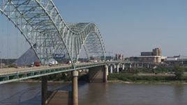 5.7K aerial stock footage of cars crossing the bridge to Memphis, Tennessee Aerial Stock Footage | DX0002_177_030