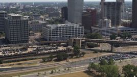 5.7K aerial stock footage of ascending away from city hall in Downtown Memphis, Tennessee Aerial Stock Footage | DX0002_177_035