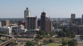 5.7K aerial stock footage stationary view of a tall office tower with spire in Downtown Memphis, Tennessee Aerial Stock Footage | DX0002_177_042